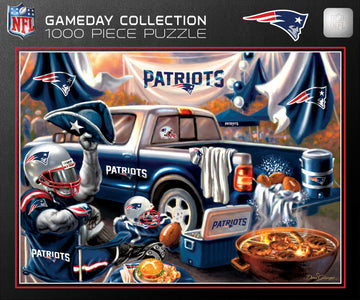 A colorful 1000-piece jigsaw puzzle featuring a fun New England Patriots gameday scene. The image shows a blue pickup truck with a Patriots logo, sporting fans, food, and various game-day items set up in a tailgating atmosphere, capturing the excitement of NFL game day.
