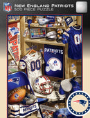 A detailed jigsaw puzzle featuring a New England Patriots locker room scene, showcasing iconic memorabilia including a football helmet, jerseys, a trophy, and team banners. The puzzle has 500 pieces and captures the essence of fan culture with vibrant colors and team branding.