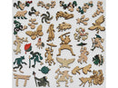 Wooden puzzle pieces shaped like people, monkeys, and plants