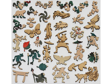 Wooden puzzle pieces shaped like people, monkeys, and plants