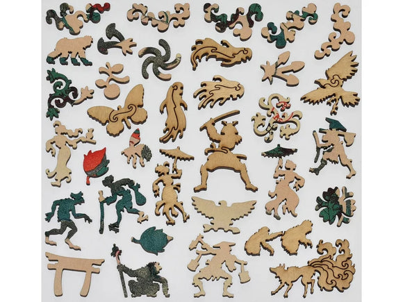 Wooden puzzle pieces shaped like people, monkeys, and plants
