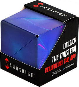 Shashibo HG: Vapor, a mechanical puzzle featuring a vibrant purple and blue design. The packaging displays instructions to unlock mysteries via an app, emphasizing the interactive experience.