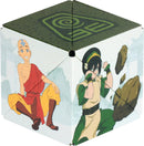 The Shashibo Avatar Earth is a unique and visually captivating cube featuring colorful illustrations of characters from Avatar: The Last Airbender. One side displays Aang, a young airbender, seated and smiling, while another showcases Toph, a skilled earthbender, in an action pose, showcasing her earthbending abilities. The cube has a decorative top with a swirling design, inviting playful interaction as it transforms into various shapes.
