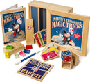 Marvin's Treasured Magic Tricks Wooden Set featuring a colorful box with the title prominently displayed, various wooden magic props including cards, blocks, and a magician's wand, aimed at young aspiring magicians.