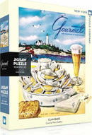 New York Puzzle Company's Clambake jigsaw puzzle featuring a vibrant illustration of a seafood feast, including oysters, alongside a beer and seaside scenery, all within a vintage magazine cover design. Contains 1000 pieces.