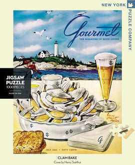 A colorful jigsaw puzzle featuring a vintage magazine cover from July 1955 titled 'Gourmet: The Magazine of Good Living'. The artwork showcases a delightful clam bake scene with a platter of oysters, lemon, and a frosted glass of beer, set against a scenic background with a lighthouse and seagulls. This 1000-piece puzzle, created by New York Puzzle Company, is designed by artist Henry Stahlhut and captures the essence of coastal dining.