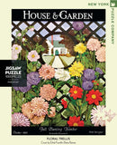 A colorful jigsaw puzzle titled 'Floral Trellis' from New York Puzzle Company. The image features vibrant flowers, including daisies and chrysanthemums, framed by a decorative trellis. The cover art is by Ethel Franklin Betts Baines and represents the October 1923 issue of 'House & Garden'. The puzzle consists of 1000 pieces, perfect for floral enthusiasts and puzzle lovers alike.