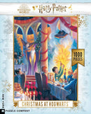 A festive jigsaw puzzle featuring a colorful scene of Hogwarts during Christmas. Characters celebrate the holiday at a table filled with food, surrounded by twinkling stars and decorations, evoking a magical atmosphere. The image showcases iconic elements of the Harry Potter universe, perfect for fans and puzzle enthusiasts alike.