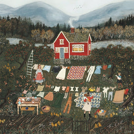 A whimsical jigsaw puzzle depicting a charming rural scene from Brambly Hedge by New York Puzzle Company. The illustration features a red house surrounded by trees and mountains, with characters hanging laundry outside. Various garments are displayed on a clothesline, and a picnic table is set with dishes. The idyllic setting includes greenery and animals, offering a nostalgic countryside atmosphere.
