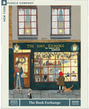 A vibrant illustration of a quaint book exchange storefront. The scene features two people, one with curly hair and a blue coat standing outside, and a child in a red coat looking at books through a window. A small dog sits nearby. The storefront is adorned with festive decorations and a sign that says 'The Book Exchange'.