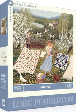 Buttercup Jigsaw Puzzle from New York Puzzle Company featuring a charming rural scene painted by Loré Pemberton. The illustration depicts a sunny landscape with a woman and a girl among blossoming trees and cows in the background, along with colorful quilts hanging on a clothesline. The puzzle has 500 pieces and measures 18x24 inches when completed, perfect for family fun and relaxation.