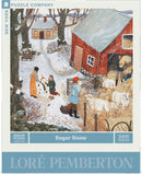 A cozy winter scene depicted in the Sugar Snow jigsaw puzzle by New York Puzzle Company. The image shows children building a snowman amidst a snowy landscape, a red barn in the background, and farm animals like sheep. The design is rich in detail, showcasing a charming countryside vibe, making it an engaging 500-piece puzzle for all ages.