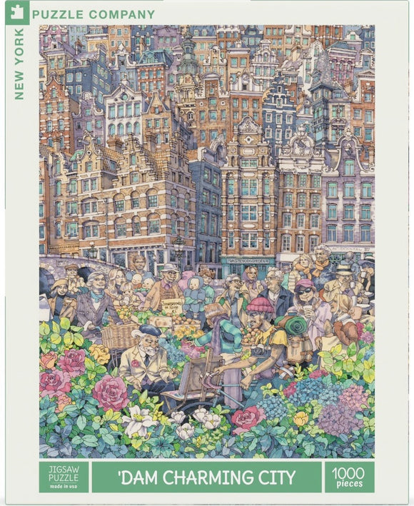'Dam Charming City' jigsaw puzzle by New York Puzzle Company featuring a vibrant, busy market scene filled with flower arrangements, people in various outfits, and whimsical buildings in the background. The puzzle contains 1000 pieces, showcasing intricate details and a colorful composition that invites puzzlers to explore and enjoy their building experience.