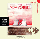 Love Kittens Mini Puzzle featuring a charming illustration of two cats forming a heart shape with their tails on a brick wall. Perfect for cat lovers, this 100-piece jigsaw puzzle from New York Puzzle Company highlights a New Yorker magazine cover by Ronald Searle, combining art and fun in one delightful package.