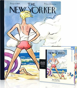 The Bay Watchers Mini Puzzle by New York Puzzle Company features a vibrant cover illustration from The New Yorker magazine, depicting a beach scene with a figure in swimwear against a backdrop of clouds and waves. The puzzle comes in a compact box, perfect for jigsaw puzzle enthusiasts looking for a colorful and fun challenge.