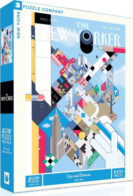 Jigsaw puzzle titled 'Ups and Downs' by New York Puzzle Company featuring a colorful illustration inspired by the New Yorker magazine cover. The puzzle consists of 1000 pieces and showcases various playful geometric shapes and cityscapes, designed by Chris Ware. The box is bright blue with vibrant visuals and detailed artwork.