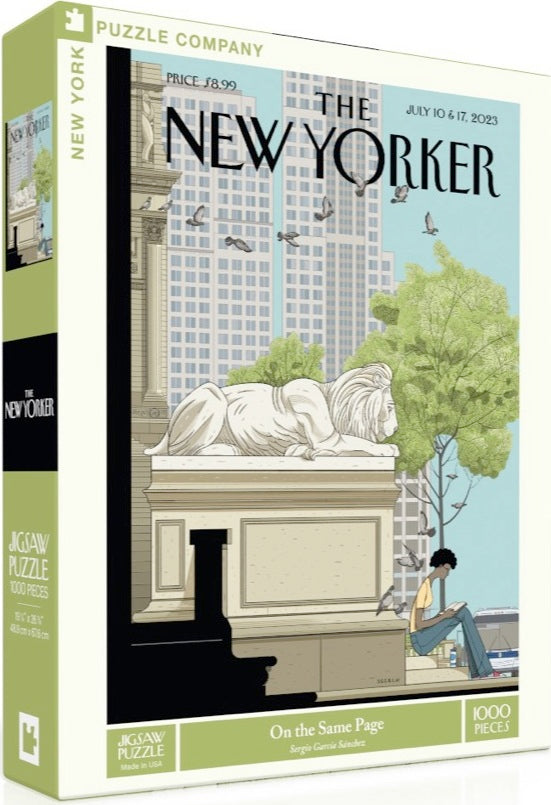 On The Same Page jigsaw puzzle by New York Puzzle Company featuring an illustration from The New Yorker. The box shows a tranquil urban scene with a person sitting beside a lion statue in a green park, surrounded by buildings and birds. The puzzle contains 1000 pieces, making it perfect for puzzle enthusiasts.