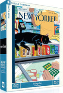 The Bodega Cat jigsaw puzzle by New York Puzzle Company features a vibrant illustration of a black cat lounging atop a store counter filled with various colorful products, including drinks and snacks, capturing the essence of a New York bodega. The box contains 1000 pieces and is suitable for puzzle enthusiasts of all ages.