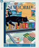 Bodega Cat jigsaw puzzle featuring a black cat lounging on a counter surrounded by colorful products. The puzzle has 1000 pieces and showcases a vibrant New York scene.