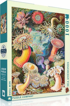 The Sea Anemones jigsaw puzzle by New York Puzzle Company features a vibrant underwater scene filled with various sea anemones, showcasing intricate details and colors. The puzzle consists of 1000 pieces and is part of the Vintage Collection, with the box displaying a captivating illustration of colorful marine life, ideal for ocean lovers and puzzle enthusiasts.