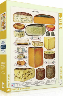 New York Puzzle Company Cheese Jigsaw Puzzle featuring a colorful illustration of various cheese types including blocks, wheels, and slices arranged on plates. The puzzle contains 500 pieces and is labeled as part of the Vintage Collection.