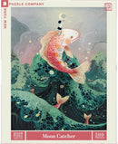 The Moon Catcher jigsaw puzzle features a whimsical illustration of a person on a giant fish, reaching for the moon amidst stylized waves and fish. The artwork showcases vibrant colors and intricate details, perfect for puzzle enthusiasts. This puzzle contains 500 pieces.