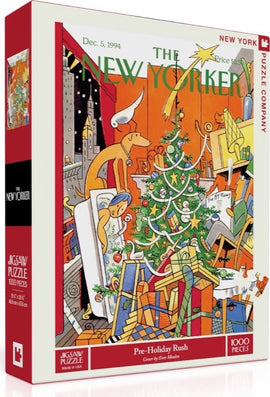 A vibrant jigsaw puzzle box titled 'Pre-Holiday Rush' by New York Puzzle Company. The artwork features a colorful depiction of a holiday scene with a Christmas tree surrounded by gifts and playful characters. It's a 1000-piece puzzle designed for holiday fun.