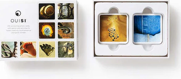 The OuiSi Original: Games of Visua is a creative card game featuring 220 connecting photo cards. It encourages players to engage their creativity and imagination with various games and activities centered around visual concepts. The box showcases intricate designs and textures on the cards, hinting at the diverse visuals players will encounter.