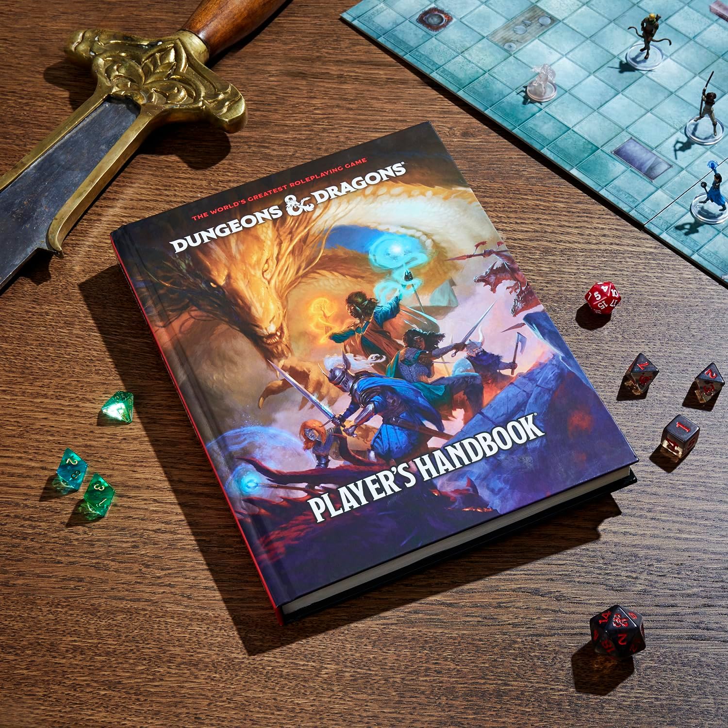 D&D Player's Handbook 2024 by Wizards of the Coast, featuring vibrant artwork of fantasy characters and creatures. The book is placed on a wooden table among gaming dice and a sword.