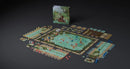 A fully set up game board for Feya's Swamp, with the box in the background.
