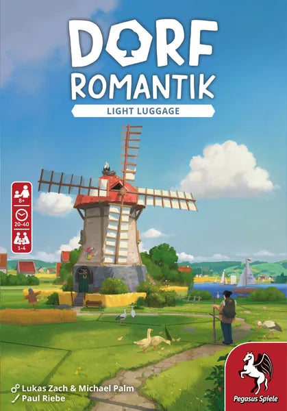 Board game box for 'Dorf Romantik Light Luggage' with a windmill and scenic landscape.