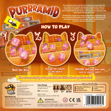 Game box for 'Purrramid' with instructions and graphics on dice and board layout.