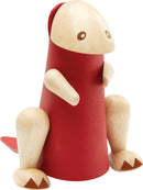 A DIY toy kit from Plan Toys that allows children to create a Tyrannosaurus figure. It features a playful design with wooden components including a red conical body and expressive limbs, fostering creativity and fine motor skills.