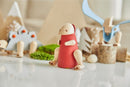 DIY Tyrannosaurus by Plan Toys. This creative kit features wooden pieces and vibrant colors, encouraging imaginative play and hands-on building for children.