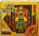 The packaging of Tut's Tablet by Project Genius features a colorful design with a cartoon depiction of a pharaoh sitting on a throne. The pharaoh holds a puzzle with various colored tiles, showcasing the game's theme of logic challenges. The box highlights '50 Challenges', suitable for ages 8 to 88, indicating it's a single-player game.