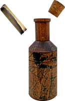 A wooden bottle puzzle titled 'Message in a Bottle' by Project Genius. The bottle features a textured, cracked appearance and is capped with a cork. A rolled parchment scroll is seen floating above the bottle, inviting curiosity and exploration.