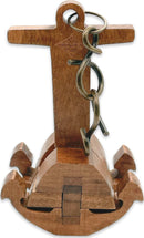 Close-up view of the Chain & Anchor mechanical puzzle by Project Genius. The puzzle is crafted from wood and features intricate designs including a cross, anchor, and chain. It challenges users to creatively figure out how to disassemble and reassemble the pieces.