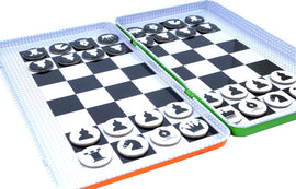 A colorful magnetic chess set from Purple Cow displayed on a contemporary black and white checkered board. The chess pieces, featuring distinct designs, are arranged neatly on the board, designed for easy movement and storage. The set showcases an engaging educational game perfect for family and friends to enjoy, fostering strategic thinking and friendly competition.