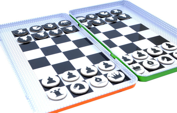 A colorful magnetic chess set from Purple Cow displayed on a contemporary black and white checkered board. The chess pieces, featuring distinct designs, are arranged neatly on the board, designed for easy movement and storage. The set showcases an engaging educational game perfect for family and friends to enjoy, fostering strategic thinking and friendly competition.