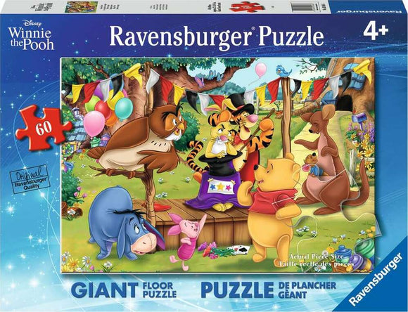 A colorful 60-piece floor puzzle featuring characters from Disney's Winnie the Pooh. The scene shows Pooh, Tigger, Piglet, and other friends celebrating with balloons, flags, and a festive atmosphere. Ideal for young children aged 4 and up, this Ravensburger puzzle promotes cognitive skills and interactive play.
