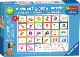 Ravensburger MFP Alphabet 30 pc Puzzle box showcasing colorful illustrations of letters A to Z with corresponding images. Ideal for children ages 3 and up to learn phonics and letter recognition through engaging visuals. The background features a cheerful design with a dog character and educational elements.