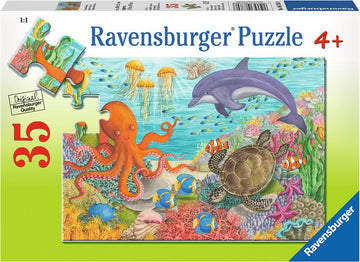 35-piece jigsaw puzzle featuring vibrant underwater scene with dolphins, an octopus, a turtle, and colorful fish among coral reefs. Ideal for children aged 4 and up, made by Ravensburger.