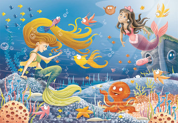 A colorful 60-piece jigsaw puzzle featuring whimsical underwater scenes with two mermaids, colorful fish, and playful sea creatures. One mermaid with long, flowing hair interacts with the marine life, while the other looks on joyfully. The puzzle is vibrant and engaging, perfect for children.