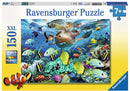 Underwater Paradise 150-piece jigsaw puzzle by Ravensburger featuring vibrant marine life. The scene captures colorful fish, coral reefs, and a turtle swimming in a clear blue ocean, perfect for puzzle enthusiasts aged 7 and up.