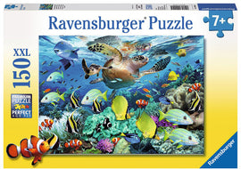 Underwater Paradise 150-piece jigsaw puzzle by Ravensburger featuring vibrant marine life. The scene captures colorful fish, coral reefs, and a turtle swimming in a clear blue ocean, perfect for puzzle enthusiasts aged 7 and up.
