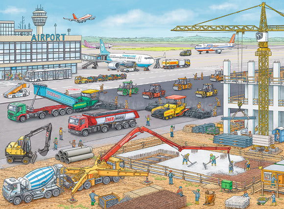 A colorful jigsaw puzzle featuring a busy airport construction site. Various vehicles such as cement mixers, cranes, and trucks are visible, alongside workers engaging in activities like digging and transporting materials. In the background, planes are taking off and parked at the terminal, creating a lively construction scene.