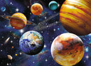 A vibrant 100-piece jigsaw puzzle depicting a colorful outer space scene featuring planets, stars, and a comet. Each planet is intricately detailed, showcasing shades of blue, orange, yellow, and green against a starry background.