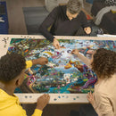 A group of three individuals working together on the Ravensburger 'Tropical Dragons' jigsaw puzzle. The colorful puzzle features a vibrant scene with magical creatures and lush foliage, spread across a wooden table. Each person is actively looking for pieces and contributing to the completion of the puzzle, showcasing a collaborative and fun atmosphere.