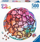 Ravensburger 500 piece round jigsaw puzzle featuring a colorful array of seashells and marine life, showcasing intricate details and vibrant colors. The puzzle includes a poster for reference.