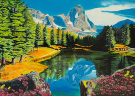 The Rocky Mountain Reflections 300 jigsaw puzzle by Ravensburger features a stunning depiction of a tranquil mountain landscape. In the foreground, vibrant pink flowers and lush green trees frame a serene lake that beautifully reflects the towering mountains and bright blue sky above. The puzzle emphasizes detail and color, inviting nature lovers to immerse themselves in this picturesque scene.